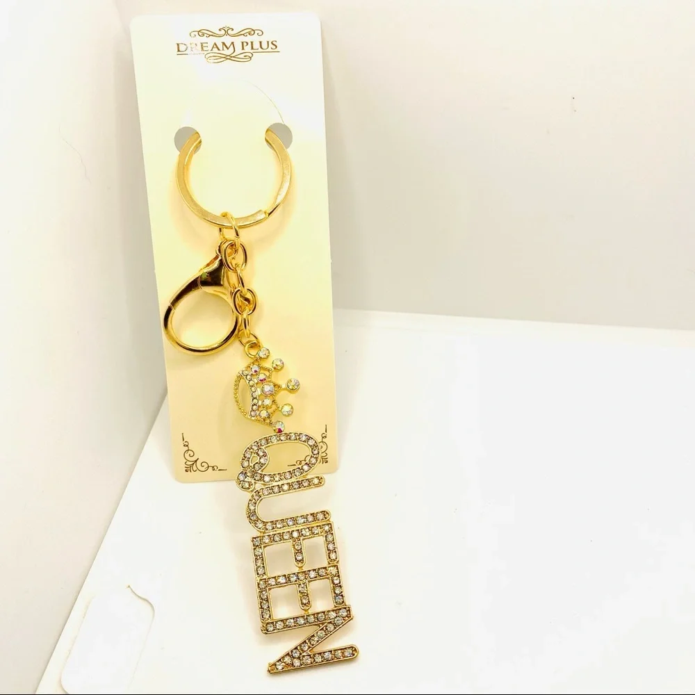 Purse Charm Key Chain Queen Iridescent Crystals set in golden tone. BRAND NEW